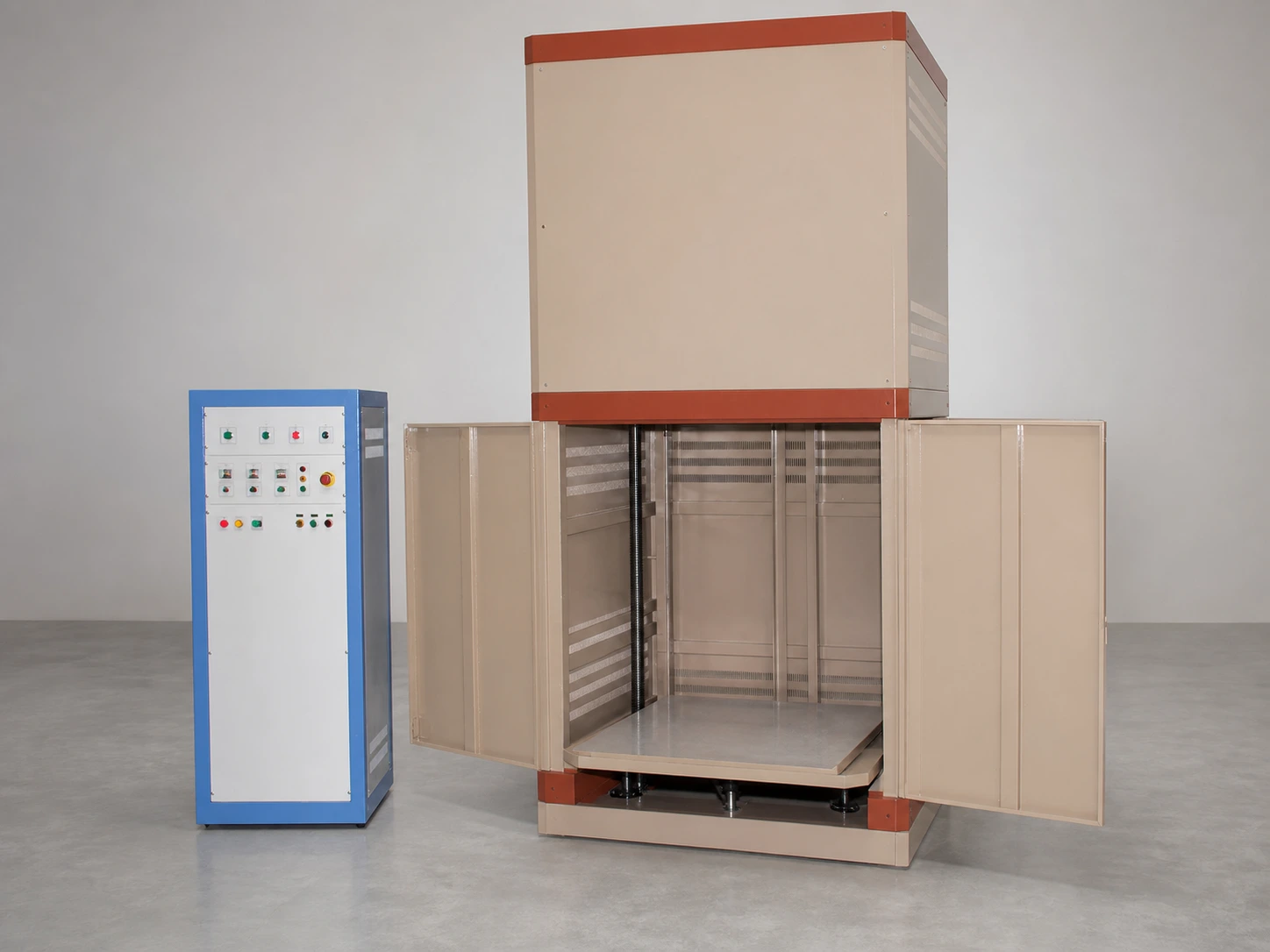 Large bottom-loading lift box furnace with open service doors, platform and separate control cabinet