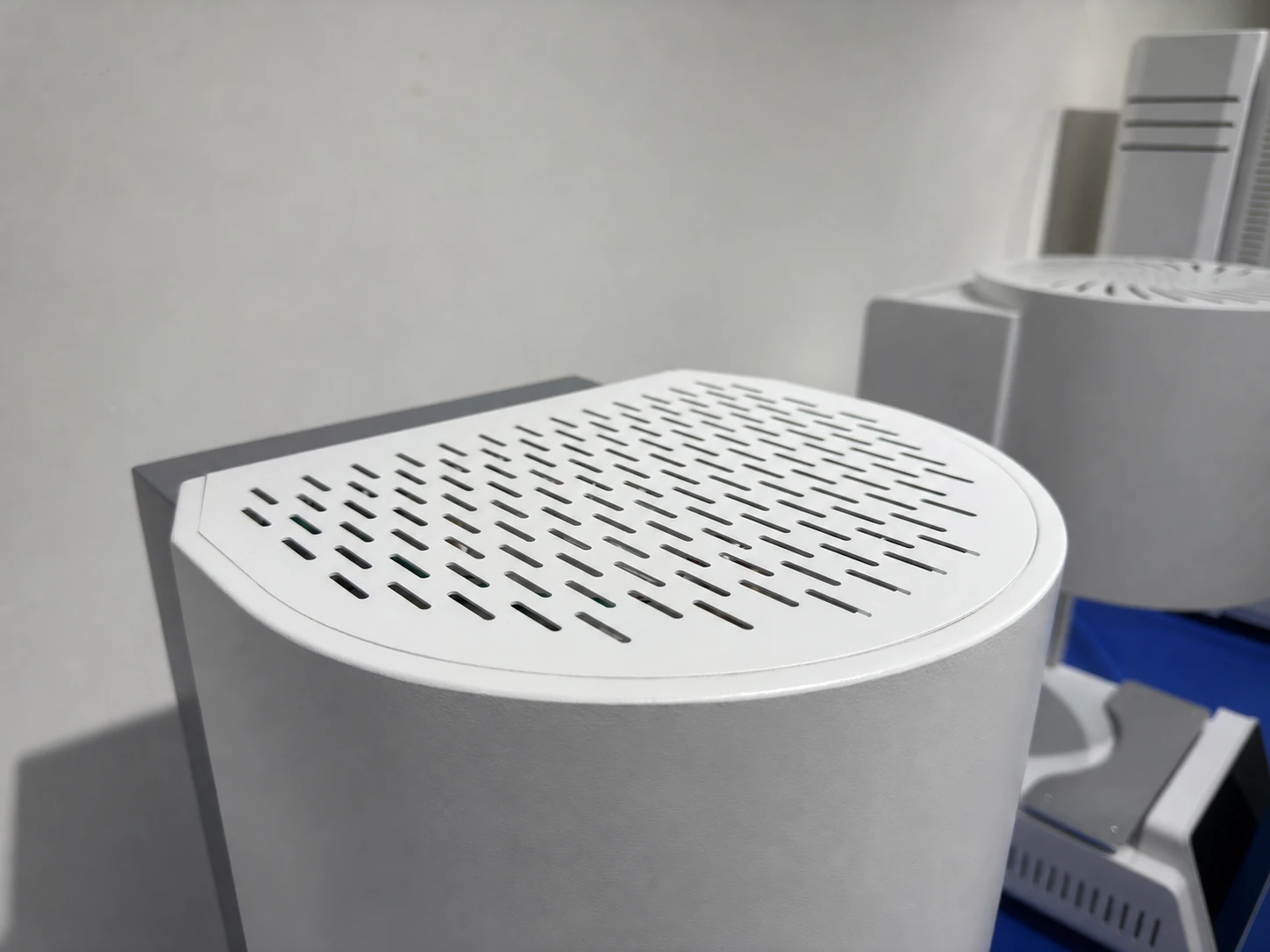 Vent and service connection detail on a compact dental laboratory furnace