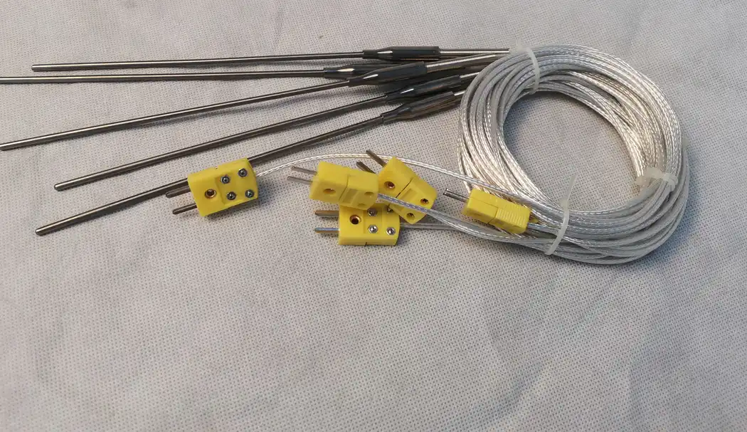 Industrial furnace thermocouple probes with braided leads and miniature connectors