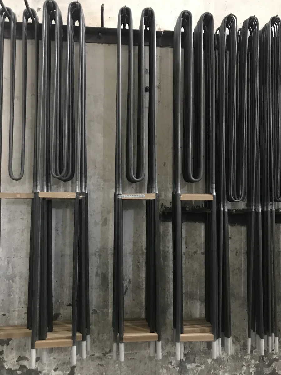 Multiple U-shaped molybdenum disilicide heating elements arranged in production