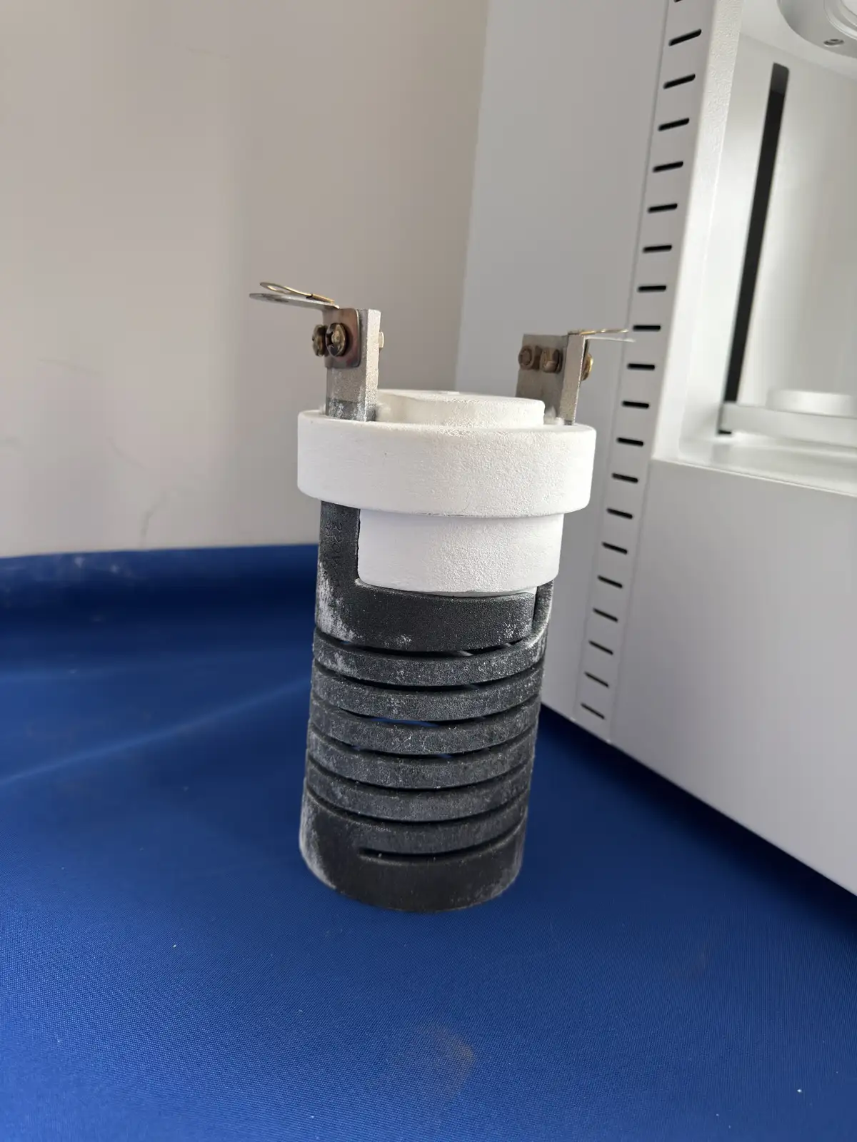 Removable silicon carbide spiral dental furnace chamber assembly with terminal connections