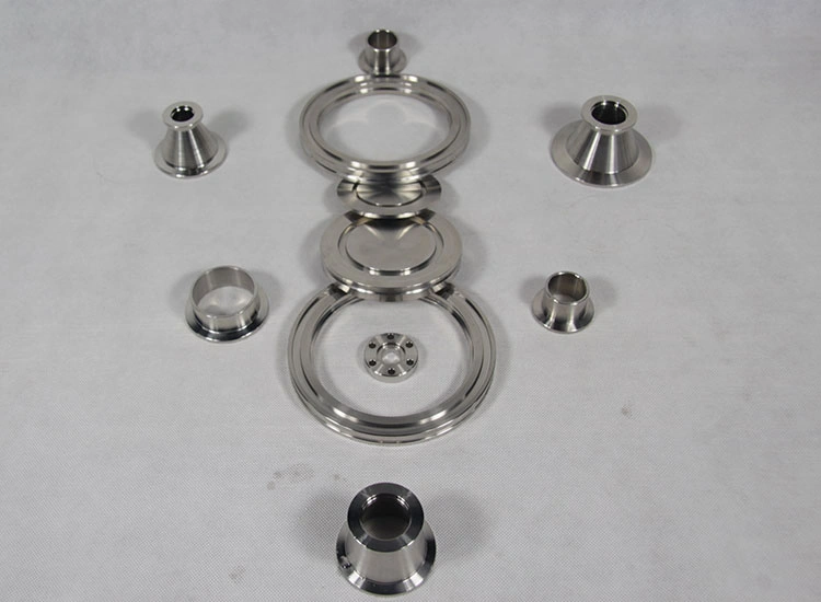 Vacuum flanges, tube adaptors, blanking parts and mating fittings